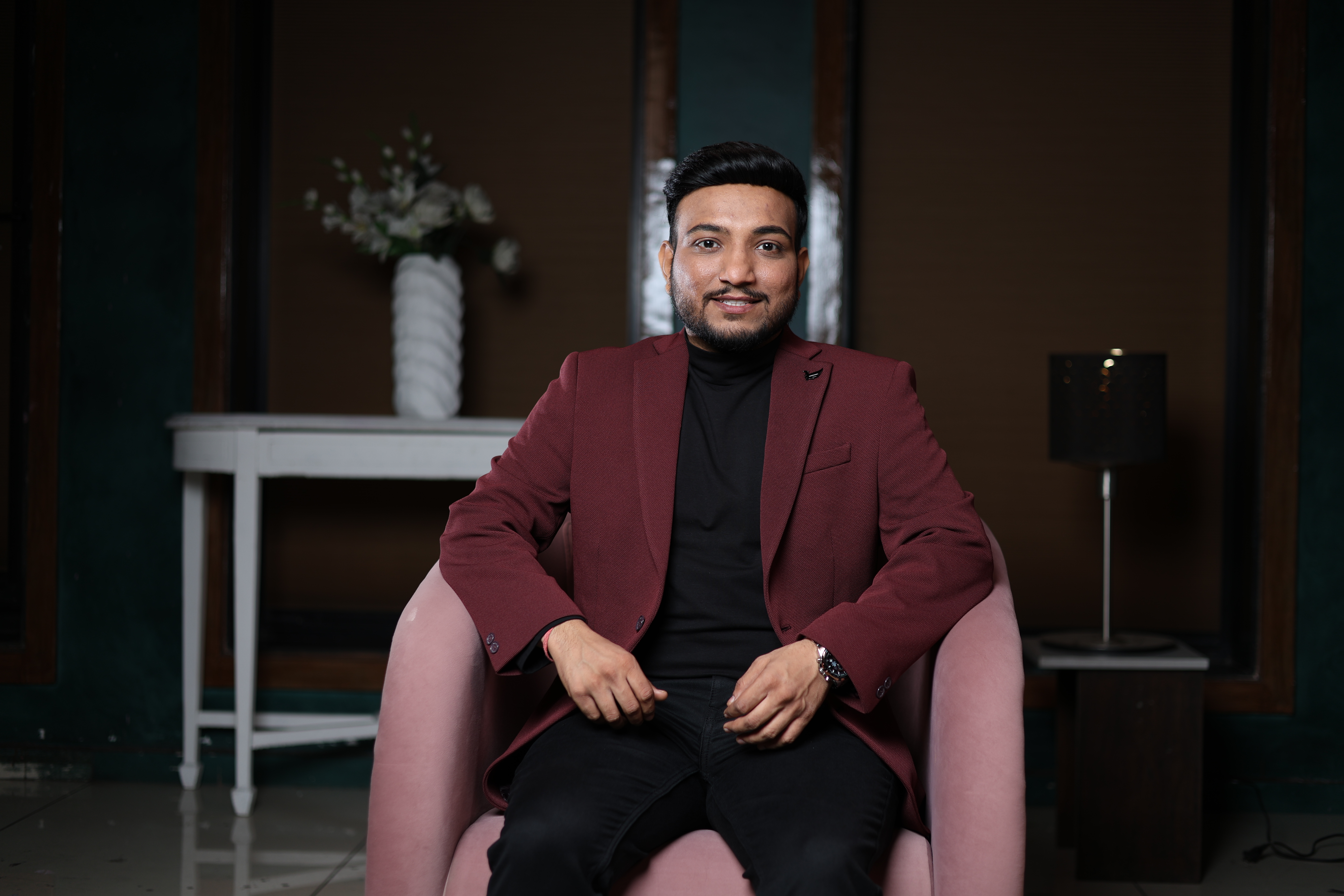 Sagar Shah — AI course instructor, relaxed seated pose