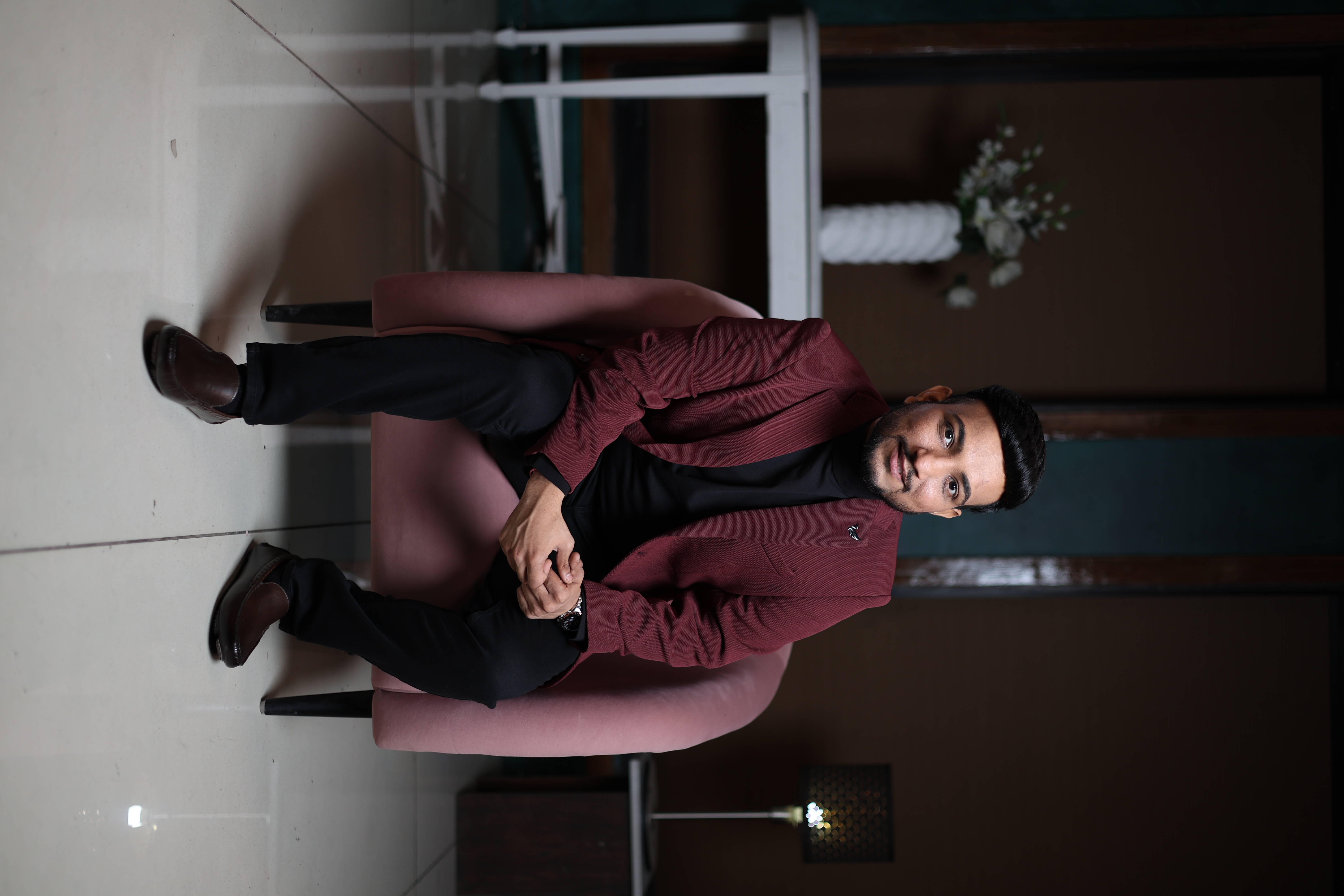 Sagar Shah seated, relaxed portrait